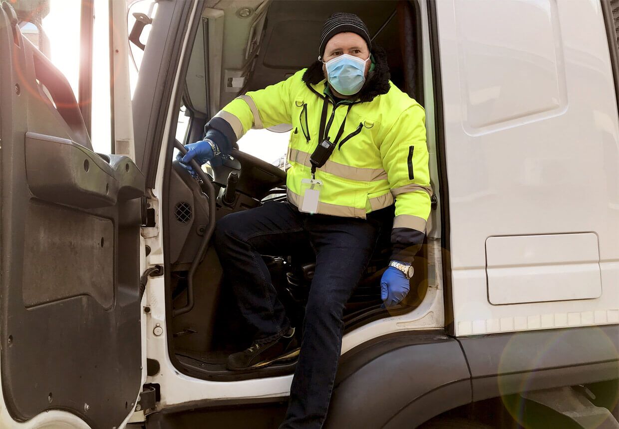 Truck driver wearing a mask to prevent covid-19 from spreading