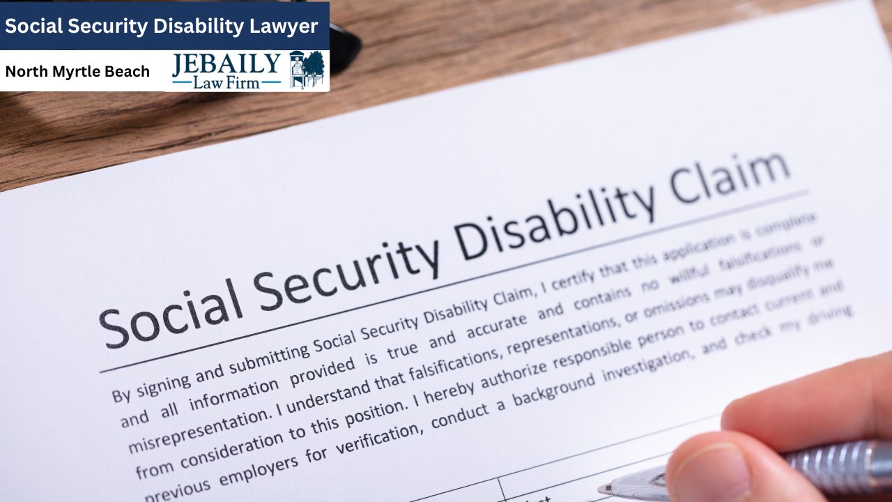 The form is on a light-brown wooden table. The top of the paper shows the heading "Social Security Disability Lawyer" and a logo/banner below, indicating a law firm, "JEBAILY - Law Firm", with the location "North Myrtle Beach".