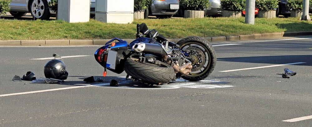 Motorcycle flipped on side after wreck
